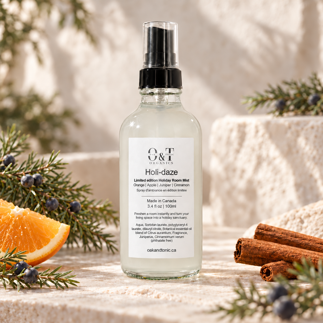 Holi-daze holiday room and linen mist in a glass spray bottle with orange, juniper and cinnamon.